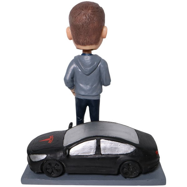 Custom Bobblehead standing by Tesla