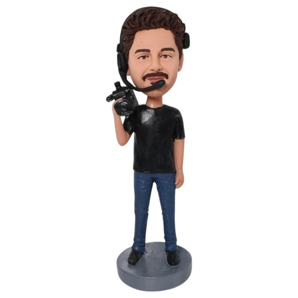Custom photographer Bobblehead holding camera with earphones