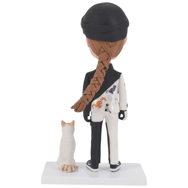 Skiing Bobblehead Custom skier in skiing suit with cat