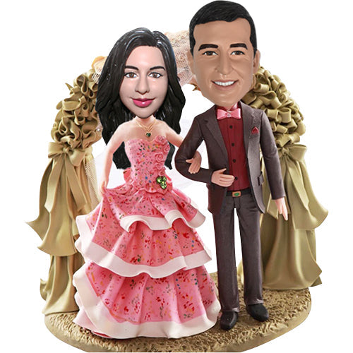 Wedding Bobbleheads Under Wedding Arch