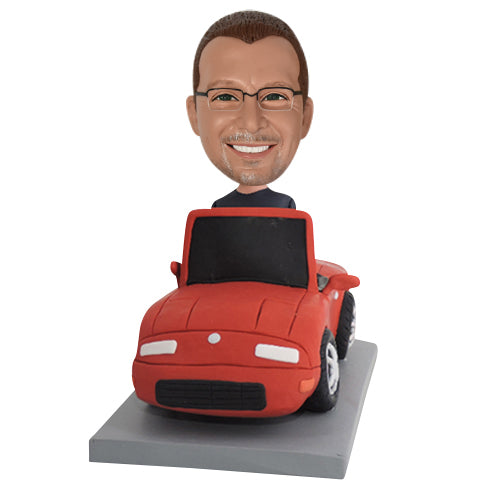 Custom Bobblehead Sitting in His Porsche