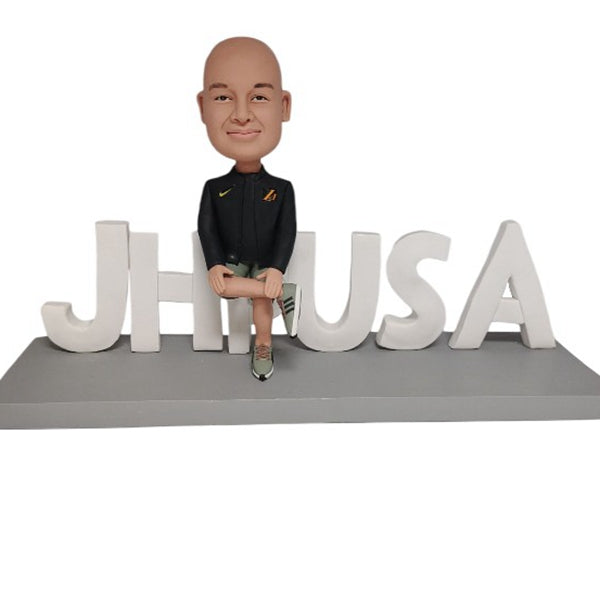 Bobblehead Personalized Sitting on Logo