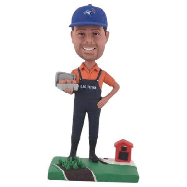 Custom Farmer Bobblehead holding eggs on the farm