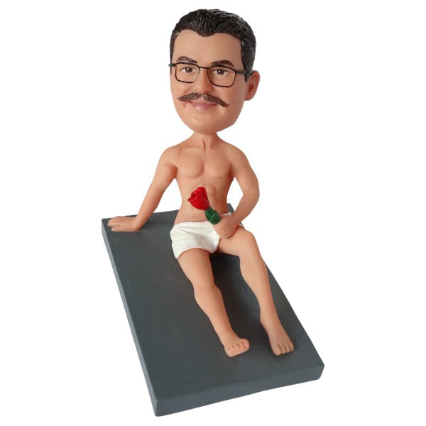 Customized Naked Bobblehead lying with rose and towel