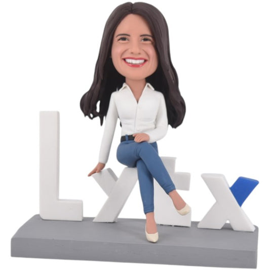 Custom Female Bobblehead Sitting on Logo