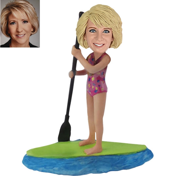 Custom Bobblehead holding paddle board surfing water